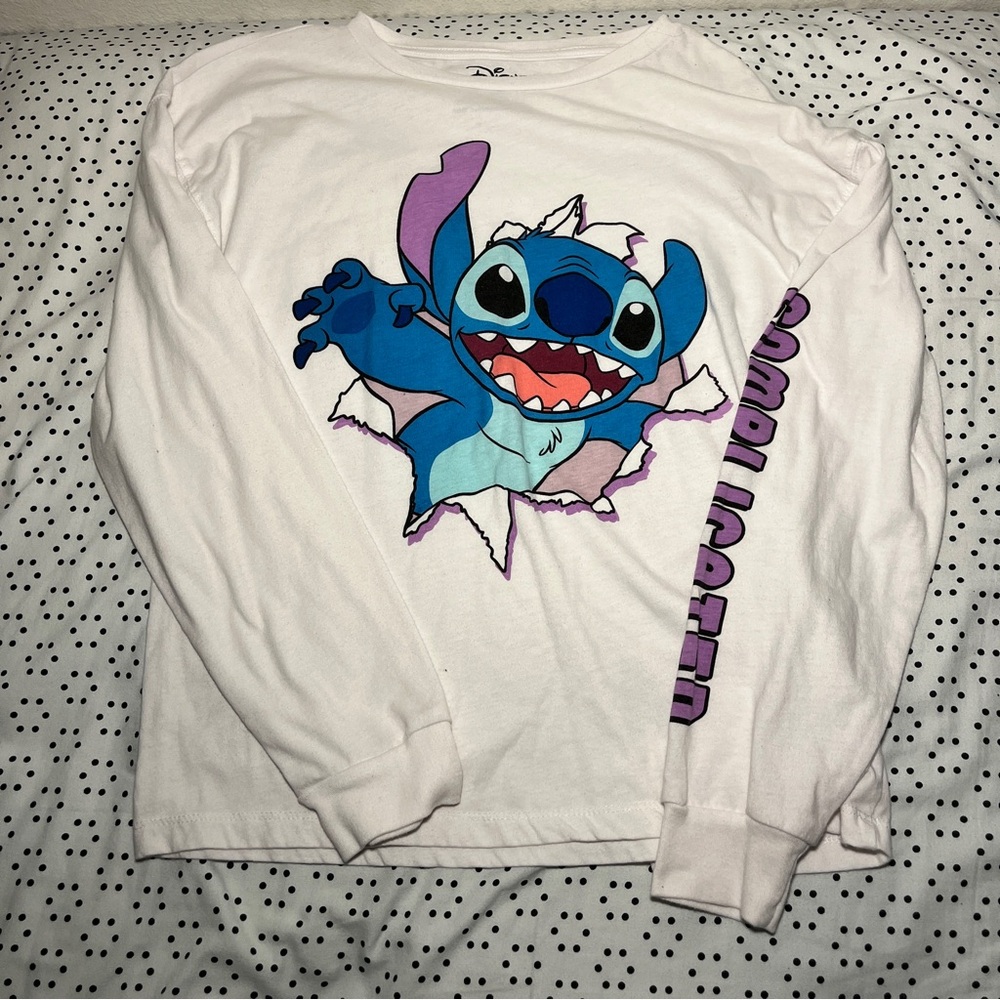 White woman’s long sleeve t shirt with stitch.